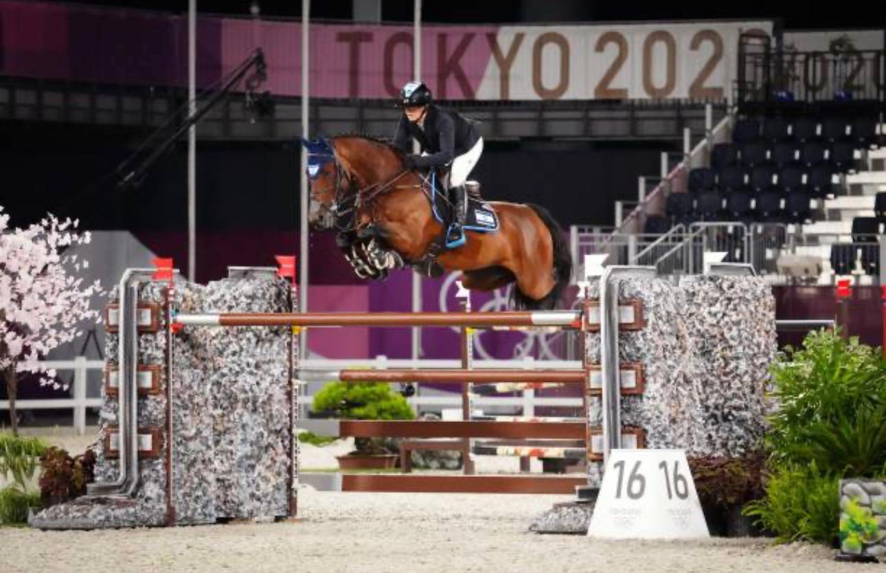 Ashlee jumping at the Tokyo Olympic Games